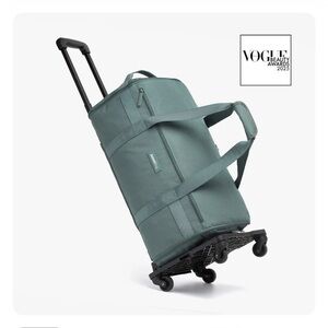 Jennibag 2.0 roller duffel in teal with packing cubes, cosmetic bag & tote NWT